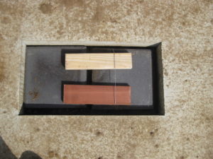 Fresh wood in termite trial "min-houses"