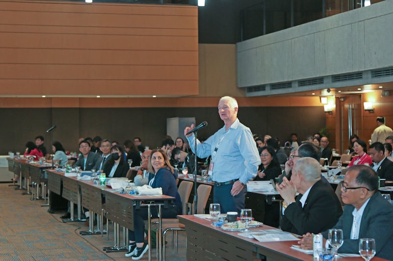 Man speaking into a microphone