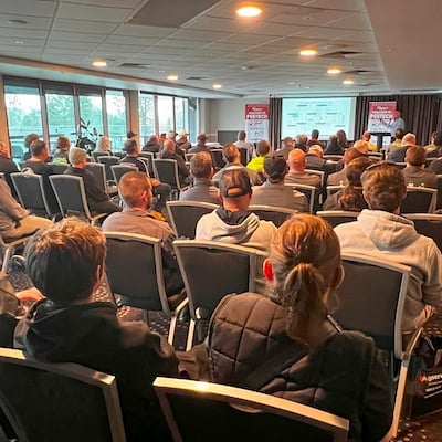 Room of people looking at a presentation