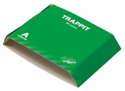 A flat green coloured moth trap, made of cardboard