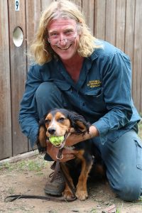 Shane Clarke with bed bug and termite detection dog