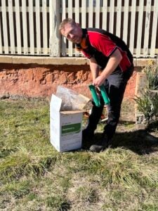 Pest manager holding Sentricon AlwaysActive stations