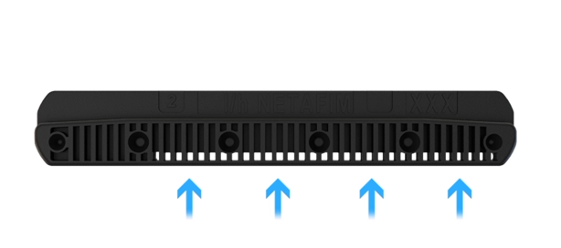 Black emitter with arrows indicating the direction of termiticide flow