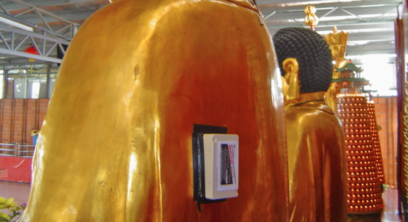 Above-ground baiting on a wooden Buddha statue infested by Coptotermes gestroi in a Chinese temple in Malaysia