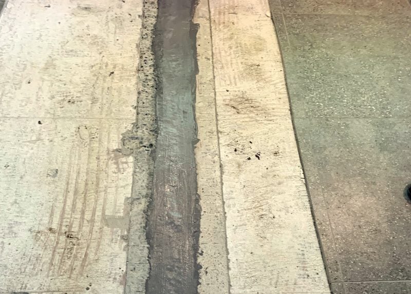 Concrete isolation joint with termite protection