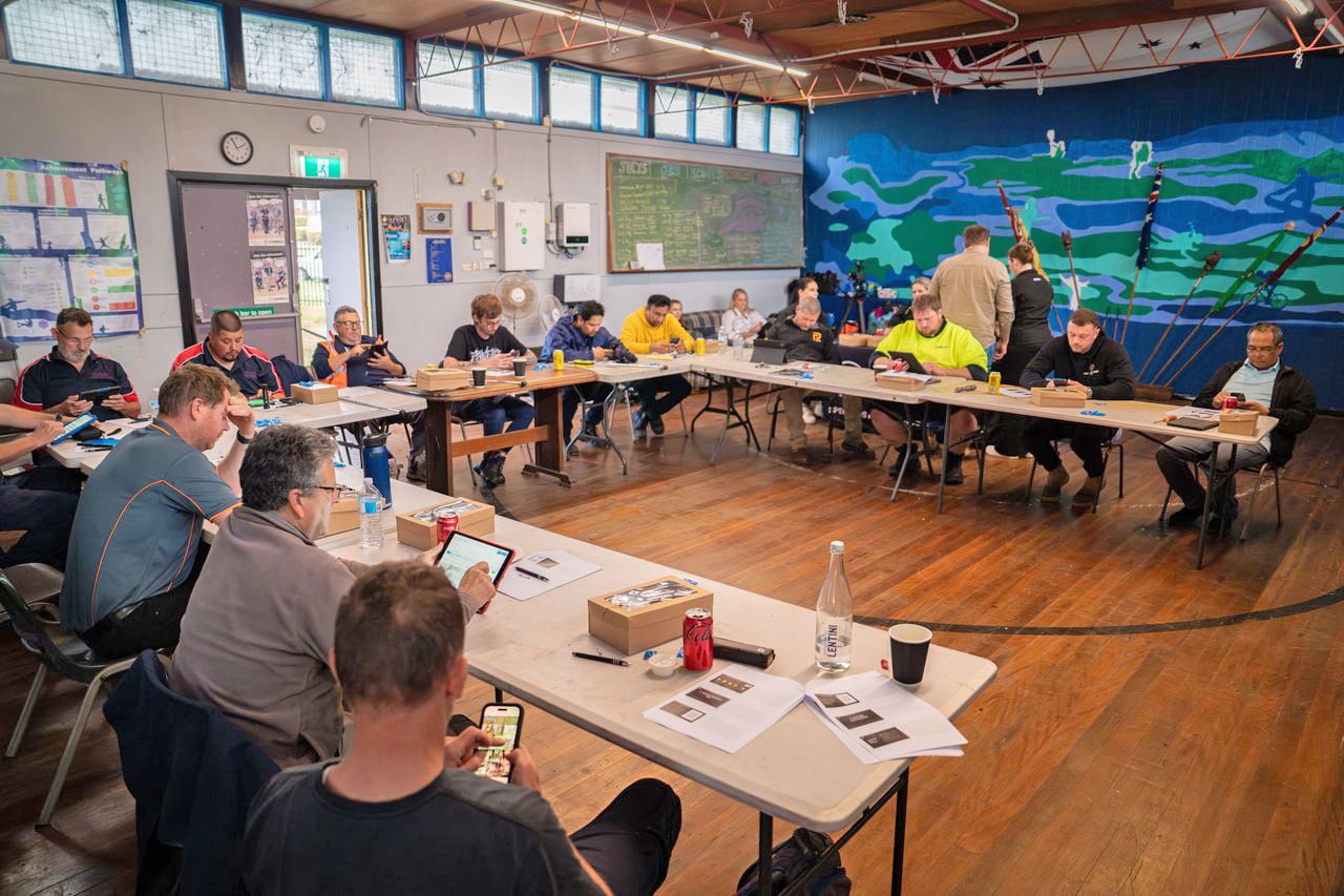 Students studying pest control in a classroom