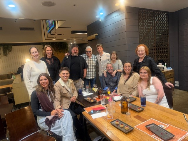 A group of people aged 25 to 65 at a pub in Australia