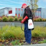 Man spraying plants with a Silvan Prograde spray unit