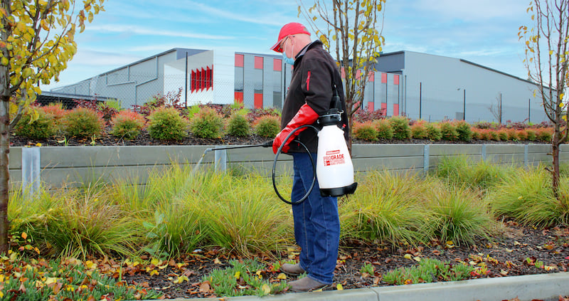 Man spraying plants with a Silvan Prograde spray unit
