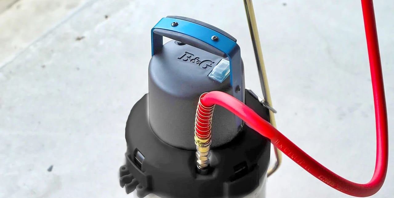 The B&G Pressurising Tank Top on top of a stainless steel spray unit